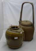 A Japanese pottery jar and a rattan food basket/carrier