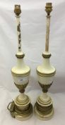 A pair of painted metal lamps