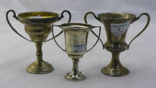Three small silver trophy cups (265 grammes)