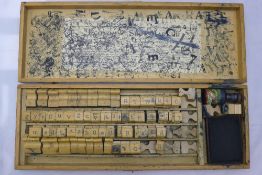 An early 20th century cased printing set