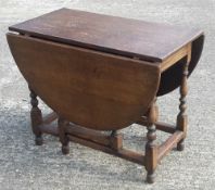 An oak drop leaf table