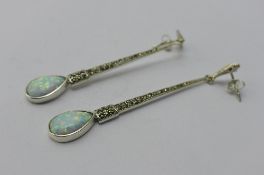 A pair of opal and marcasite drop earrings