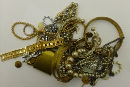 A bag of costume jewellery, etc.