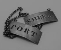A pair of Georgian silver decanter labels for PORT and SHERRY