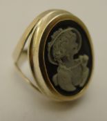 A silver cameo ring