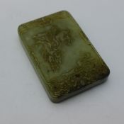 A jade tablet decorated with calligraphy