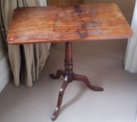 A George III mahogany tilt top tripod table