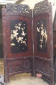 A late 19th century Japanese two fold bone inset lacquered screen