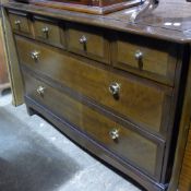 A reproduction mahogany sideboard together with a stag chest of drawers