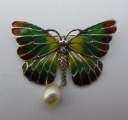 A silver and enamel butterfly brooch