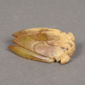 A Chinese carved russet jade cicada 7 cm long.