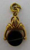 An unmarked yellow metal banded agate and bloodstone fob