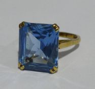 A 9 ct gold blue stone set ring (5 grammes all in)