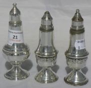 A pair of Sterling silver cruets and a single cruet