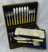 A mahogany cased plated fish service together with cased plated fish servers