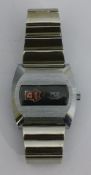 A 1970s jump hour/crawl minutes wristwatch