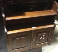 An Edwardian mahogany wall cabinet