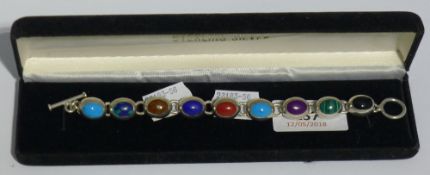 A silver multi stone bracelet