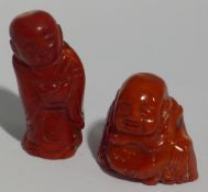 Two coral Buddhas