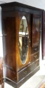 An Edwardian mahogany wardrobe