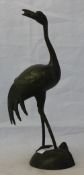 An Oriental bronze model of a stork