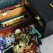 A leather jewellery box, another, and a quantity of costume and other jewellery,