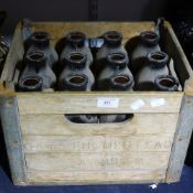 A crate of old milk bottles