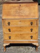 An early 20th century walnut bureau