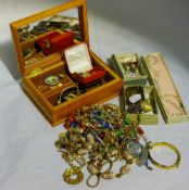 A quantity of costume jewellery, gold earrings, a silver napkin ring, etc.