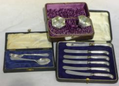 A cased pair of silver salts, Birmingham 1885, a cased silver Christening fork and spoon,