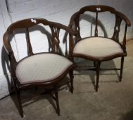 A pair of Edwardian mahogany corner chairs,