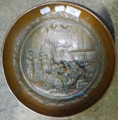 A copper relief decorated classical dish