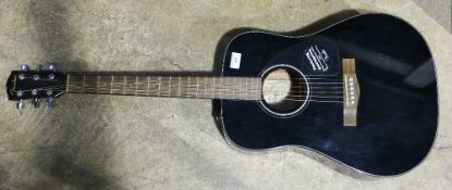 A Fender guitar, labelled inside,