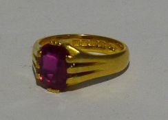 An 18 ct gold gentleman's, possibly ruby set ring (8.