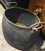 A cast iron cooking pot