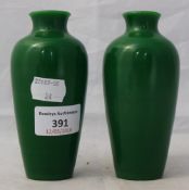 A pair of small green Peking glass vases