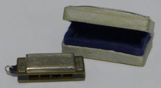 A miniature harmonica