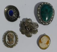 A quantity of silver brooches