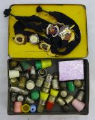 A quantity of thimbles and badges