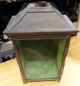 A glazed copper wall mounted lantern