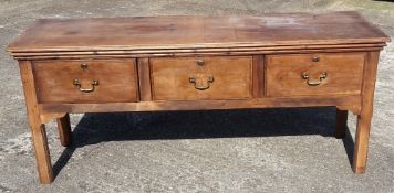 An early 20th century dresser base