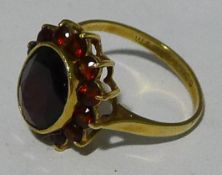 A 9 ct gold garnet set ring (2.