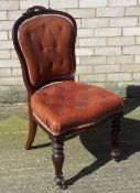A Victorian mahogany framed leather upholstered chair