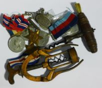 Two corkscrews and a quantity of medals, etc.