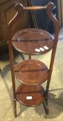 A three tier wooden cake stand