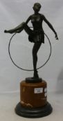 A bronze Art Deco style hoop girl