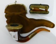 A 9 ct gold mounted amber cheroot holder and a silver mounted Meerschaum pipe