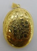 A 9 ct gold locket (13.