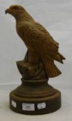 A painted plaster model of an eagle