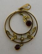 A Victorian unmarked gold seed pearl and garnet pendant (1.